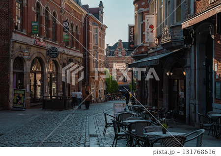 Leuven, Belgium - April 26, 2025: Lively Oude Markt Square in Leuven, Belgium, known as the longest bar in the world, with historic buildings and vibrant atmosphere. 131768616