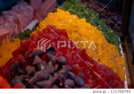 A cuberdon, a cone-shaped Belgian candy. It is also known in dutch as a neus, Ghent nose, or neuzeke (little nose) and in french as chapeau-de-pretre (priest's hat). A cuberdon, a cone-shaped Belgian candy. It is also known in dutch as a neus, Ghent nose, or neuzeke (little nose) and in french as chapeau-de-pretre (priest's hat). 131768793