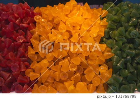 A cuberdon, a cone-shaped Belgian candy. It is also known in dutch as a neus (nose), Gentse neus (Ghent nose), or neuzeke (little nose) and in french as chapeau-de-pretre (priests hat). 131768799
