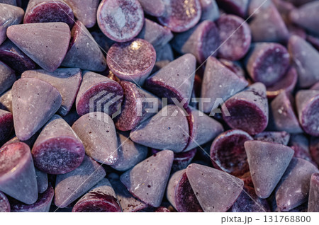A cuberdon, a cone-shaped Belgian candy. It is also known in dutch as a neus (nose), Gentse neus (Ghent nose), or neuzeke (little nose) and in french as chapeau-de-pretre A cuberdon, a cone-shaped Belgian candy. It is also known in dutch as a neus (nose), Gentse neus (Ghent nose), or neuzeke (little nose) and in french as chapeau-de-pretre 131768800