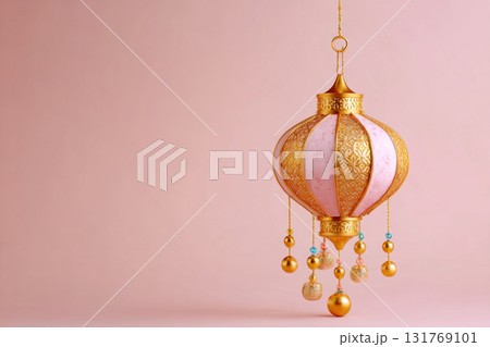 Traditional Chinese lantern with intricate gold design and hanging beads Traditional Chinese lantern with intricate gold design and hanging beads 131769101