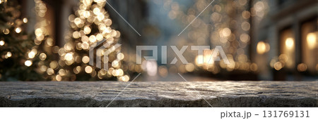 Empty stone tabletop with blurred Christmas trees and glowing festive lights in background 131769131