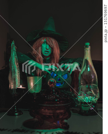 Witch with Halloween Pumpkin Doing Magic Witch with Halloween Pumpkin Doing Magic 131769697