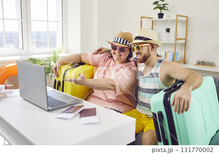 Funny happy family couple going on summer vacation Funny happy family couple going on summer vacation 131770002