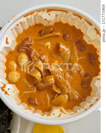 Chewy rose yeotteok coated in spicy pink sauce paired with a crispy corndog, blending sweet, savory, and spicy flavors. A trendy Korean street food duo perfect for food promotions. Chewy rose yeotteok coated in spicy pink sauce paired with a crispy corndog, blending sweet, savory, and spicy flavors. A trendy Korean street food duo perfect for food promotions. 131773969