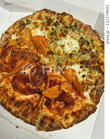 A delicious pizza with a golden crust, melted cheese, and savory toppings. Perfect for food-related designs, menus, or Italian-themed projects, capturing the essence of a classic comfort dish. A delicious pizza with a golden crust, melted cheese, and savory toppings. Perfect for food-related designs, menus, or Italian-themed projects, capturing the essence of a classic comfort dish. 131774691