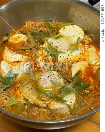 Shin Ramyun,close up of Ramyeon or Ramyun is a Korean-style soup noodle dish with a spicy flavor. Ramyeon or Korean instant noodles with egg - Korean food style 131774697