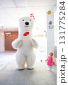Little Girl and Huge Life-Size Bear Doll 131775284
