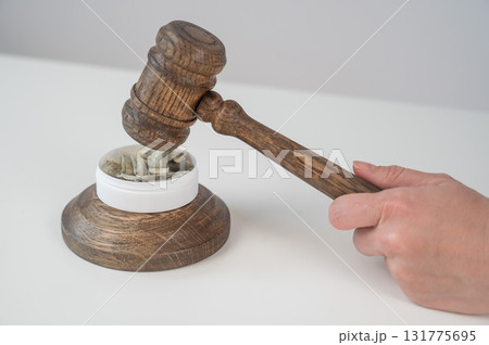 Judge Bangs Gavel. Chewing Tobacco Ban. Judge Bangs Gavel. Chewing Tobacco Ban. 131775695