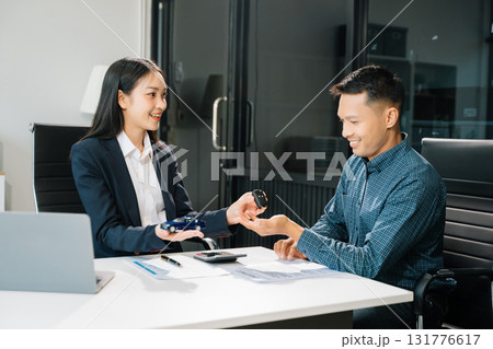 Capturing a cheerful business consultation scene with smiling professionals, perfect for illustrating corporate success, teamwork, Capturing a cheerful business consultation scene with smiling professionals, perfect for illustrating corporate success, teamwork, 131776617