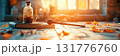 Intricate wand resting on a beautifully carved surface with magical artifacts scattered around 131776760