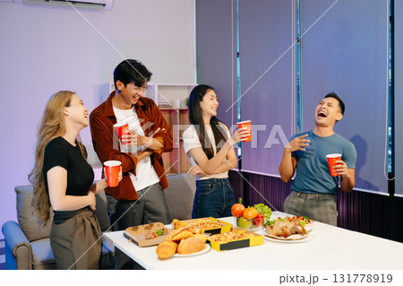 Group of Young Asian friend having, enjoy evening party together at home. 131778919