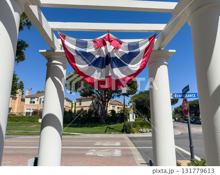 American flag against blue sky. American flag against blue sky. 131779613