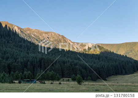 Sunrise over the mountains in Kyrgyzstan Sunrise over the mountains in Kyrgyzstan 131780158