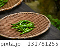 ザルに盛られたシシトウ 131781255