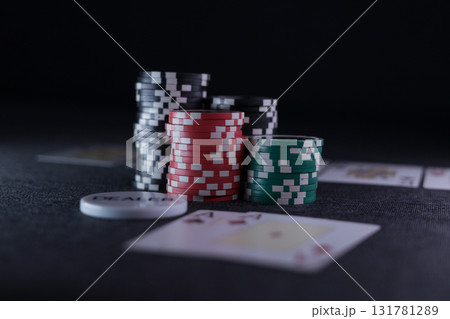 the poker game in casino chips cards and the poker table the poker game in casino chips cards and the poker table 131781289