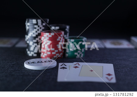 the poker game in casino chips cards and the poker table the poker game in casino chips cards and the poker table 131781292