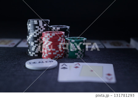 the poker game in casino chips cards and the poker table 131781293