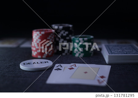 the poker game in casino chips cards and the poker table 131781295