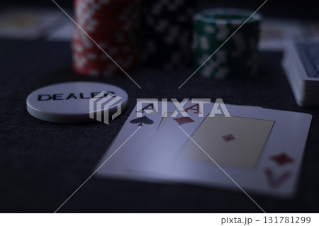 the poker game in casino chips cards and the poker table the poker game in casino chips cards and the poker table 131781299