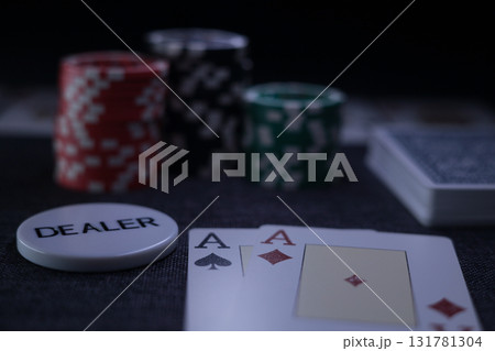 the poker game in casino chips cards and the poker table the poker game in casino chips cards and the poker table 131781304