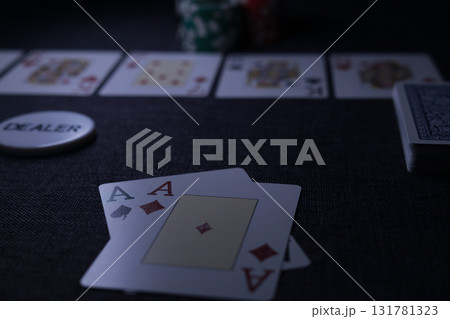 the poker game in casino chips cards and the poker table the poker game in casino chips cards and the poker table 131781323