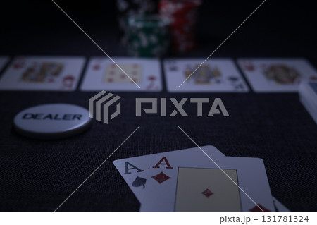 the poker game in casino chips cards and the poker table the poker game in casino chips cards and the poker table 131781324