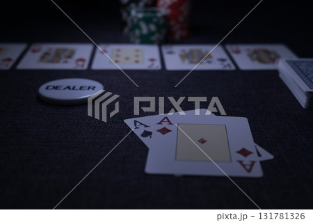 the poker game in casino chips cards and the poker table 131781326