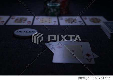 the poker game in casino chips cards and the poker table 131781327
