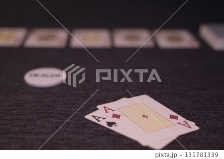 the poker game in casino chips cards and the poker table the poker game in casino chips cards and the poker table 131781339