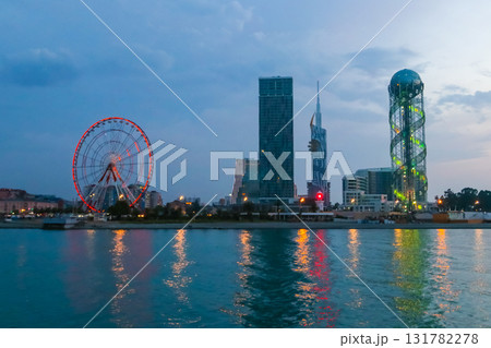 Batumi, Adjara, Georgia. View from the sea on illuminated resort town at evening Batumi, Adjara, Georgia. View from the sea on illuminated resort town at evening 131782278