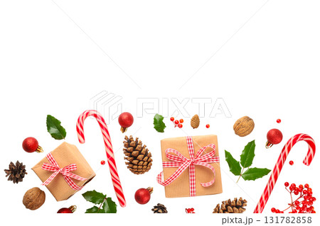 Festive decorations with colorful Christmas gifts, on white, PNG 131782858
