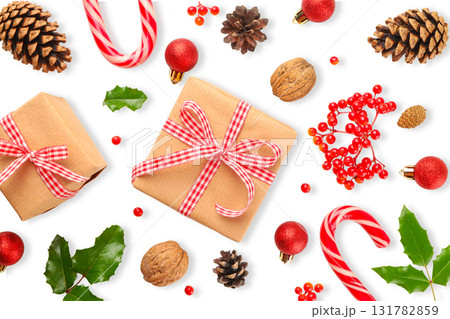 Festive gifts, candy canes, and ornaments, on white, PNG Festive gifts, candy canes, and ornaments, on white, PNG 131782859