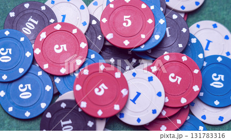 A pile of poker chips with numbers 1 through 50 131783316