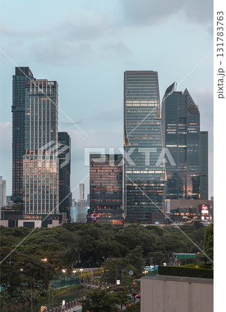 the high-rise buildings of the One Bangkok and Dusit Central Park developments with Lumphini Park in the foreground. the high-rise buildings of the One Bangkok and Dusit Central Park developments with Lumphini Park in the foreground. 131783763