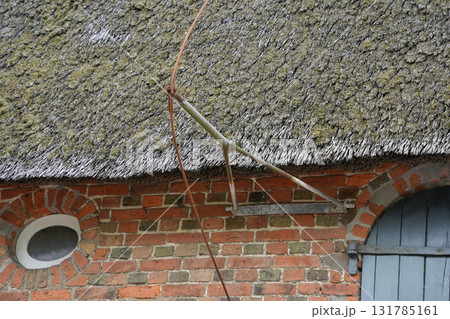lightning rod detail on frisians house roof in Sylt Island Germany lightning rod detail on frisians house roof in Sylt Island Germany 131785161