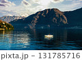 Fisher (blurred motion) on lake Como in boat Fisher (blurred motion) on lake Como in boat 131785716