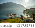 nICE VIEW ONcoastline of  lAKE Como: :boats moored by pier in oparking lots nICE VIEW ONcoastline of  lAKE Como: :boats moored by pier in oparking lots 131785733