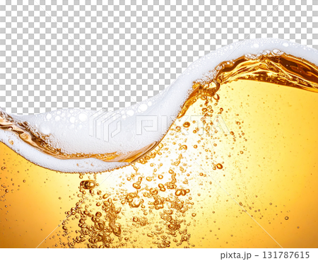 A splash of yellow beer is poured into a clear glass, creating white foam on a white background. 131787615