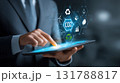 Business Professional Using Tablet with Holographic CO2 Reduction Interface 131788817