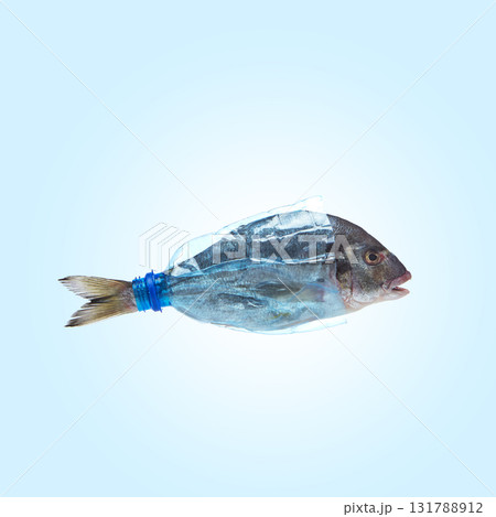 Fish enclosed in transparent plastic bottle concept of ocean pollution Fish enclosed in transparent plastic bottle concept of ocean pollution 131788912