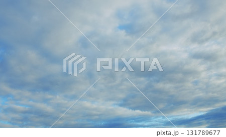 A Dynamic and Everchanging Cloudscape Gracefully Above a Serene and Beautiful Sky 131789677