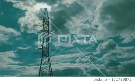 An Electric Transmission Tower symbolizes modernity against a cloudy sky, essential for power 131789873