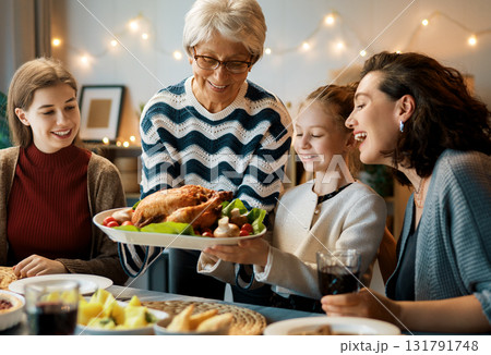 Family celebrating Thanksgiving Day Family celebrating Thanksgiving Day 131791748