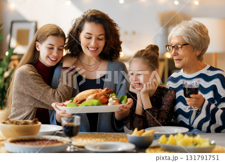 Family celebrating Thanksgiving Day 131791751