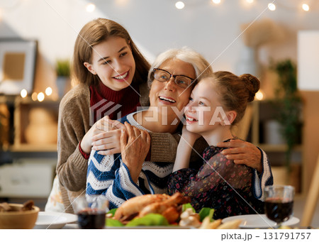 Family celebrating Thanksgiving Day 131791757