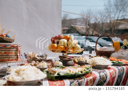 A large plate of pilaf with rice and raisins on a festive table A large plate of pilaf with rice and raisins on a festive table 131794185