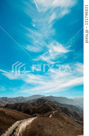 Scenic Great Wall Against Blue Sky and Mountain Range 131796831