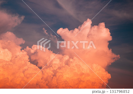 Brightly Colored Sunset Clouds Illuminating the Evening Sky Brightly Colored Sunset Clouds Illuminating the Evening Sky 131796852