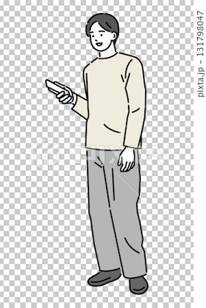 A man holding and operating a mobile phone A man holding and operating a mobile phone 131798047